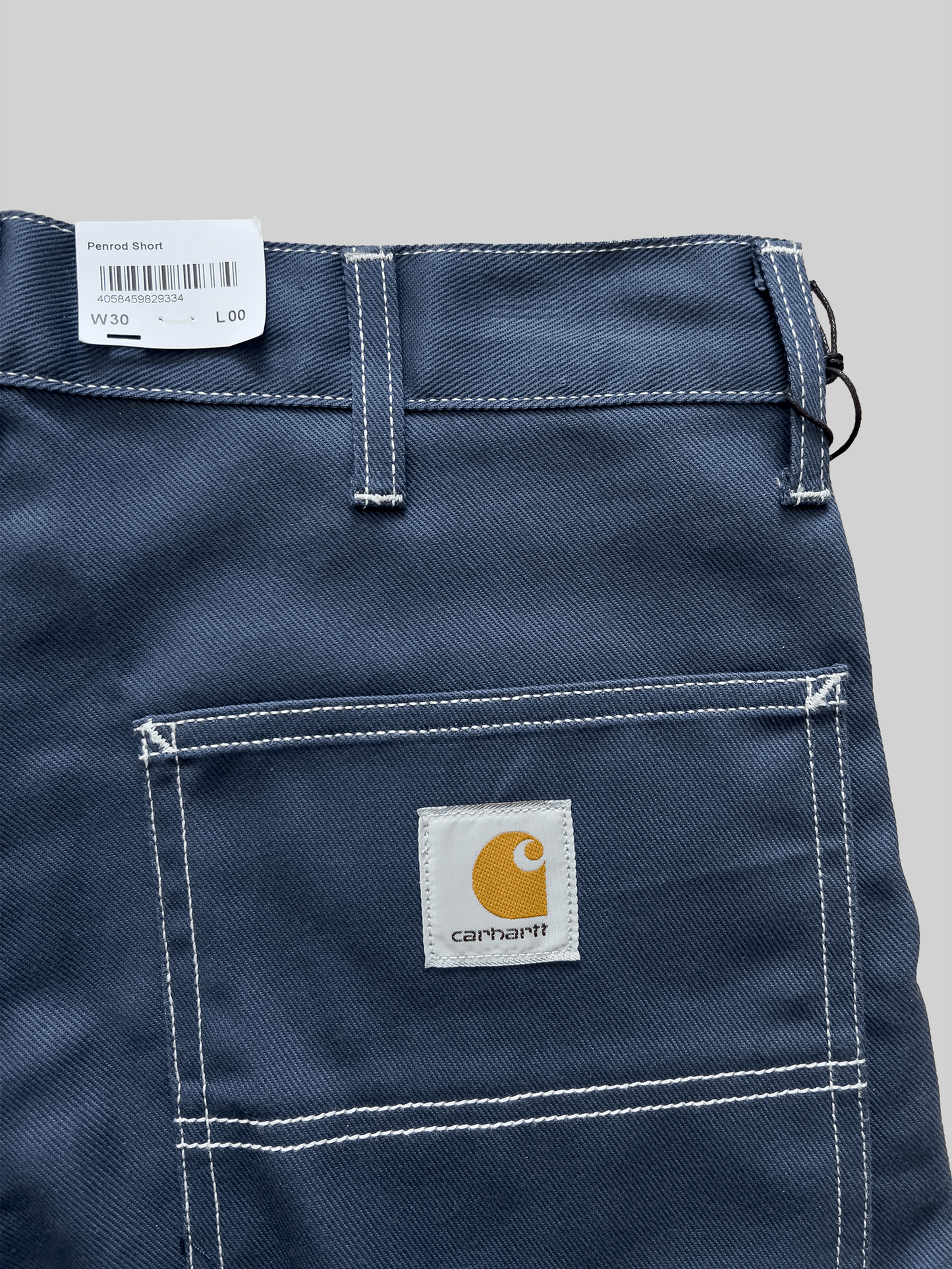 Kraťasy modré s bílým stitchingem Carhartt WIP Penrod Shorts (W30)