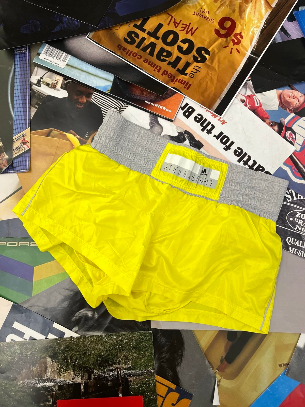 STELLA SPORT kraťasy šusťákové žluté s šedým pasem M